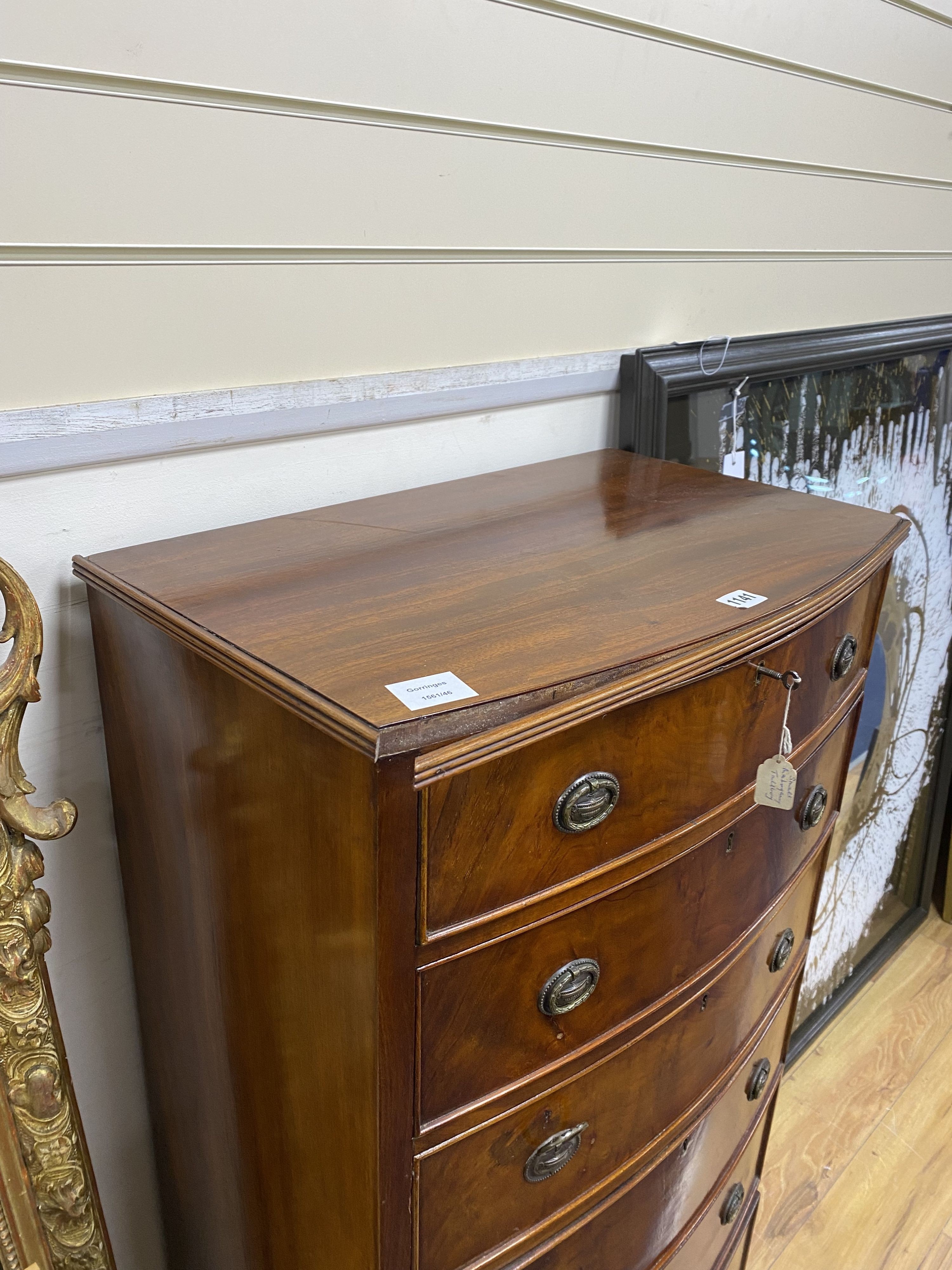A George III style mahogany bow fronted chest, width 60cm, depth 38cm, height 123cm
